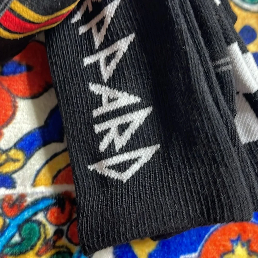 Two sets of socks - Def Leppard and Top Gun